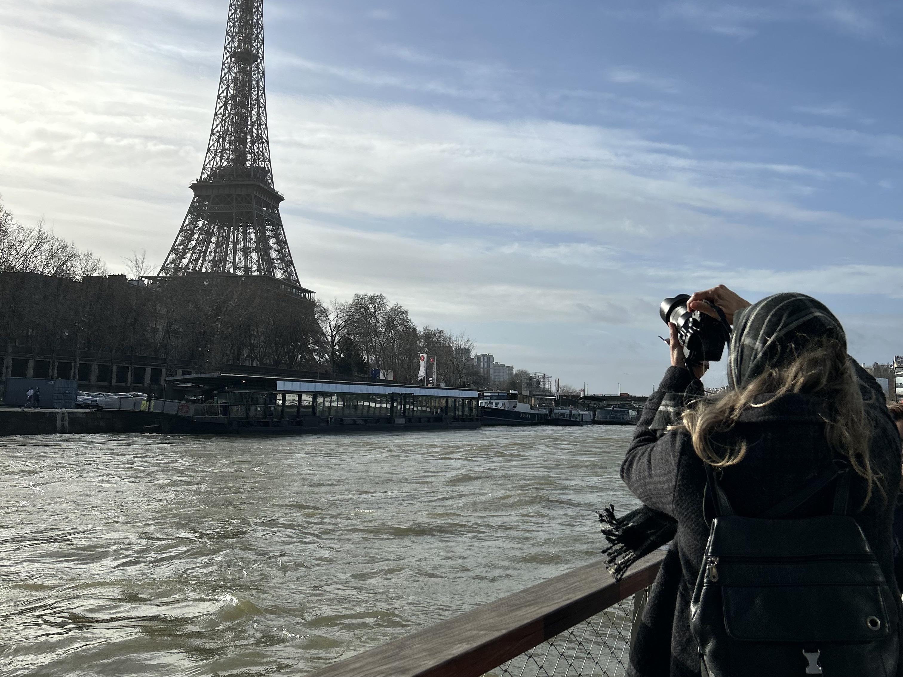 Sightseeing cruise in winter + Eiffel Tower + lady taking a photo